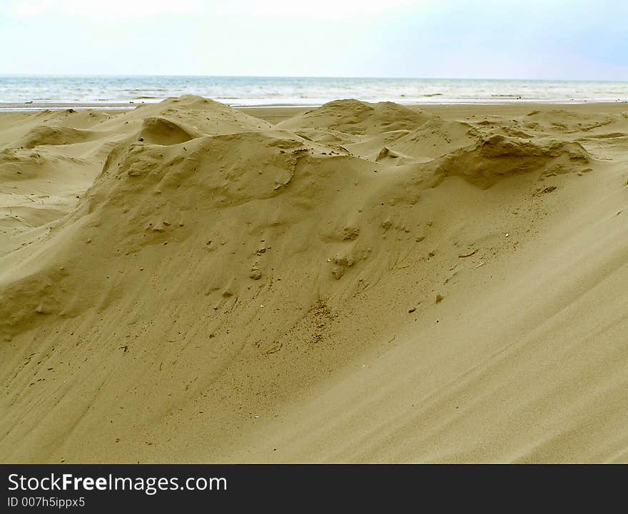 Sandy Background showing the dunes. Sandy Background showing the dunes