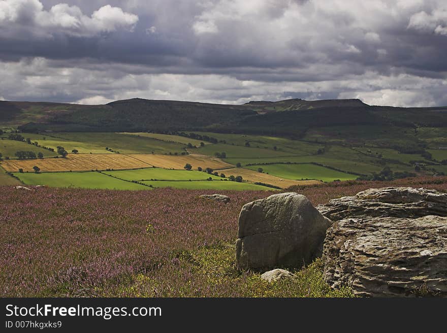 Moor in front of view of farmland and hills. Moor in front of view of farmland and hills