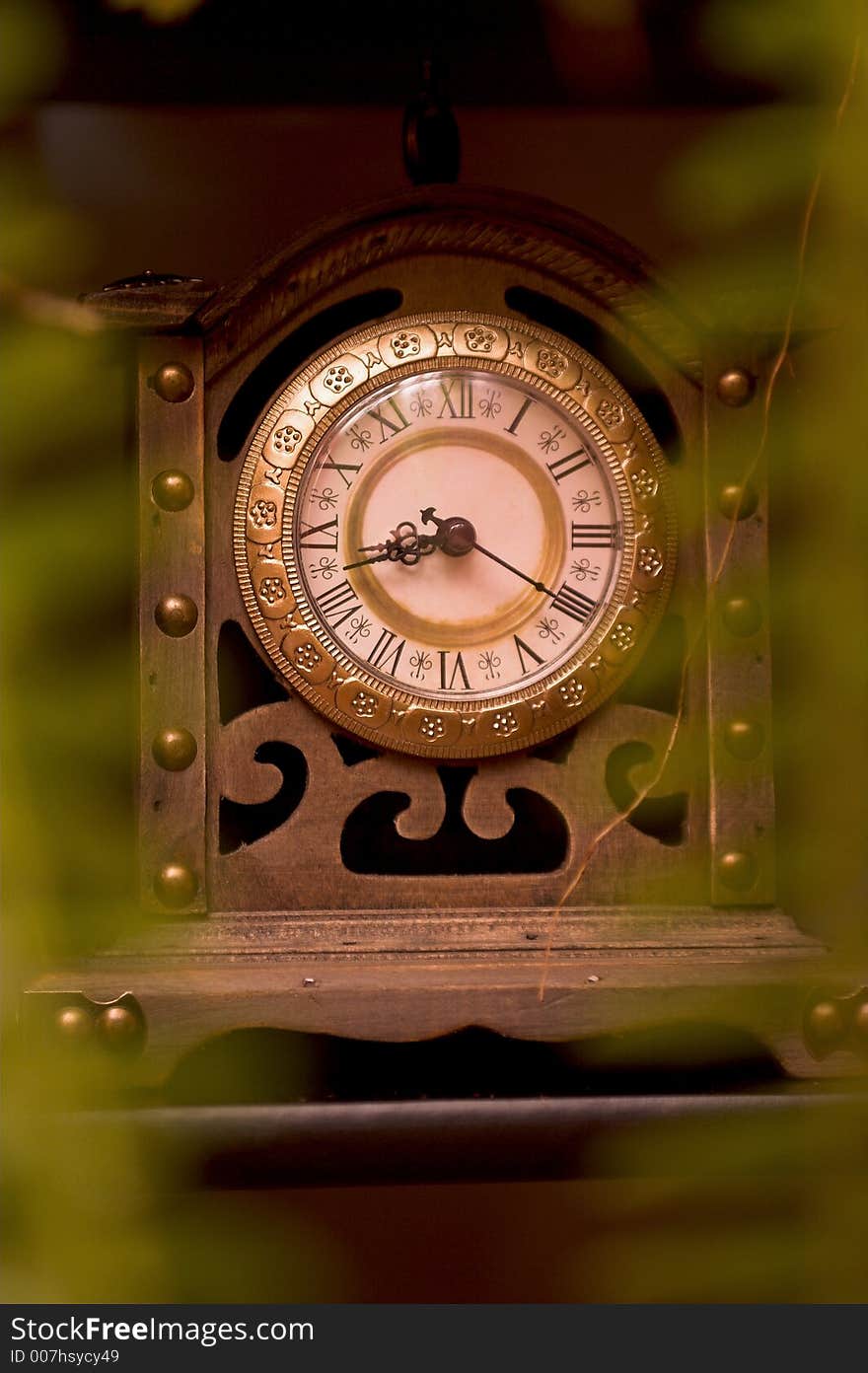 Old wooden clock showing time. Old wooden clock showing time