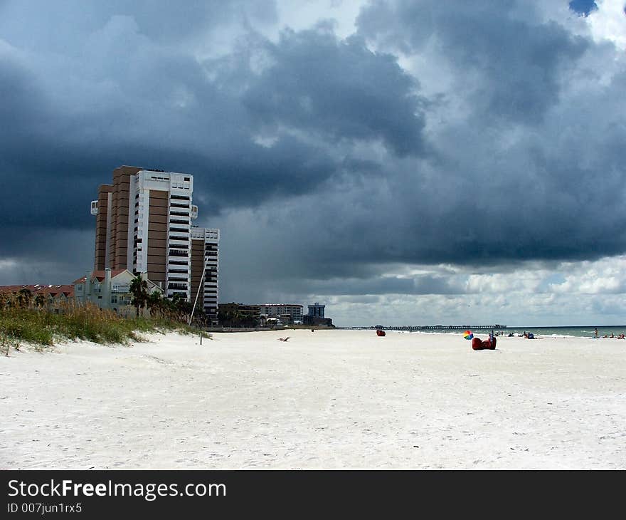 The sky darkens as a storm rolls in over the water. The sky darkens as a storm rolls in over the water.