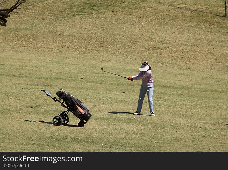 Lady golf swing sequence series (5 of 6)