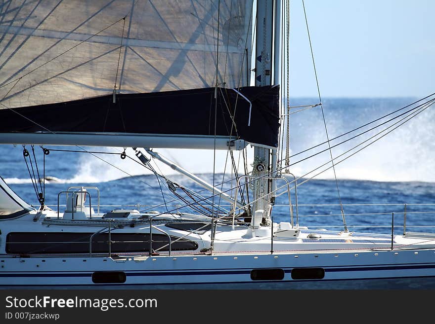 Sailboat mast with splash in background