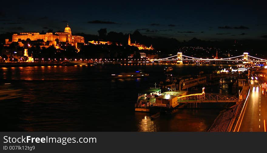 Budapest night view surprising the Royal Palace, Matyas Church and the Chain Bridge over the Danube. Budapest night view surprising the Royal Palace, Matyas Church and the Chain Bridge over the Danube.