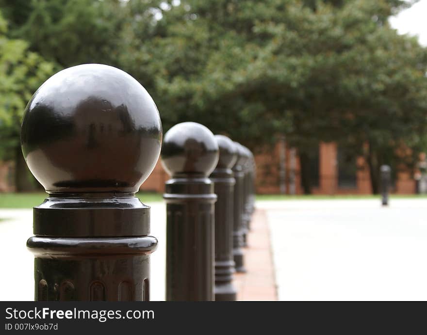 Row of Black Posts creating a security barrier. Row of Black Posts creating a security barrier