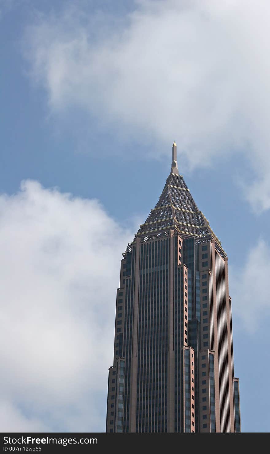 Top of office tower against sky. Top of office tower against sky