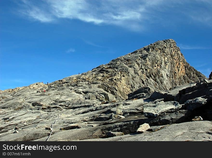 View of a mountain highest summit from below. View of a mountain highest summit from below