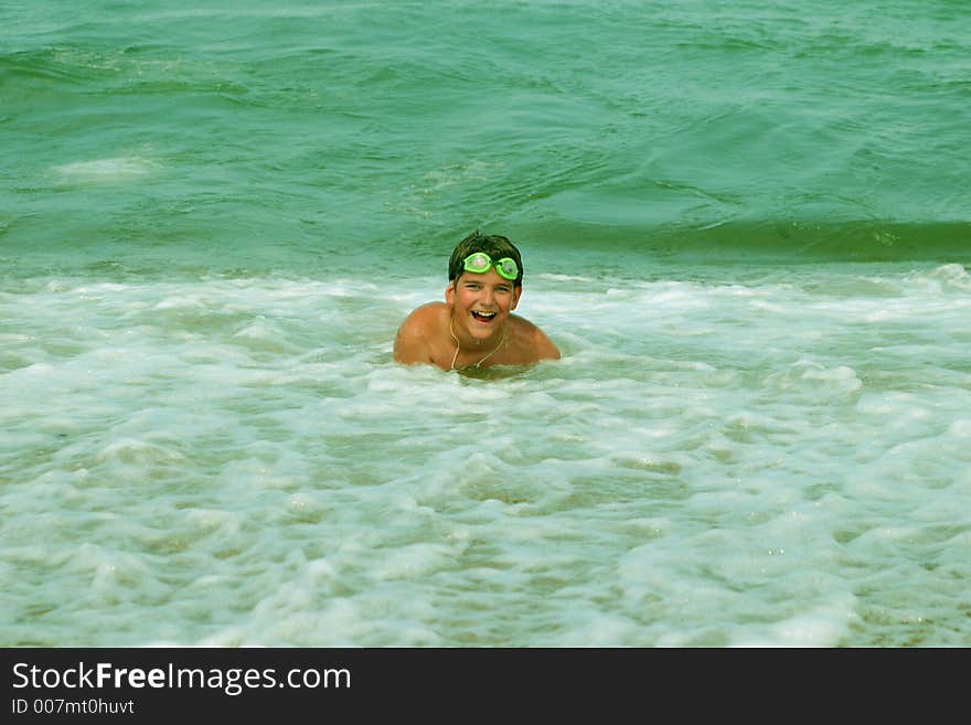 The teenager bathe in the sea