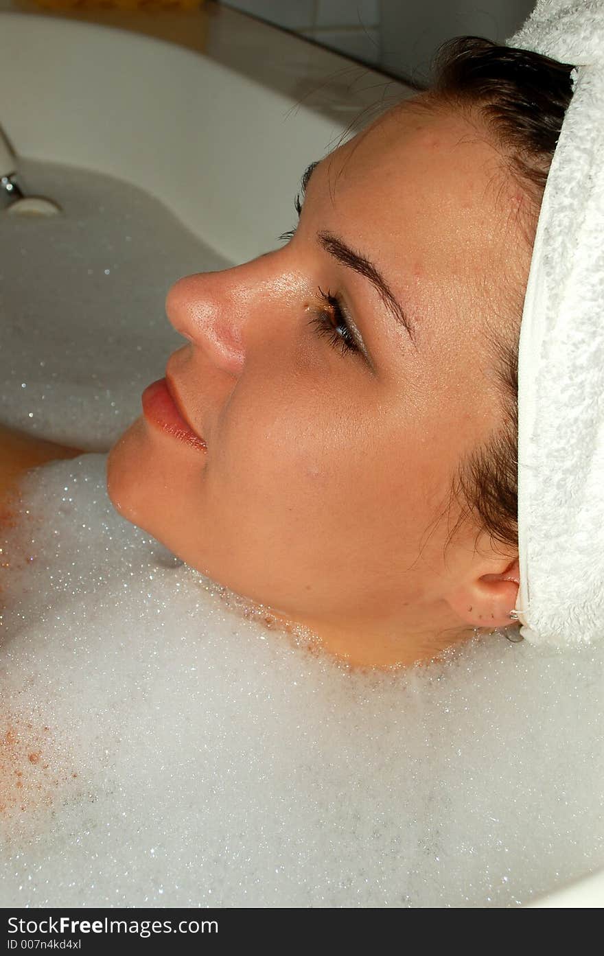 Beautiful girl taking bath with foam. Beautiful girl taking bath with foam