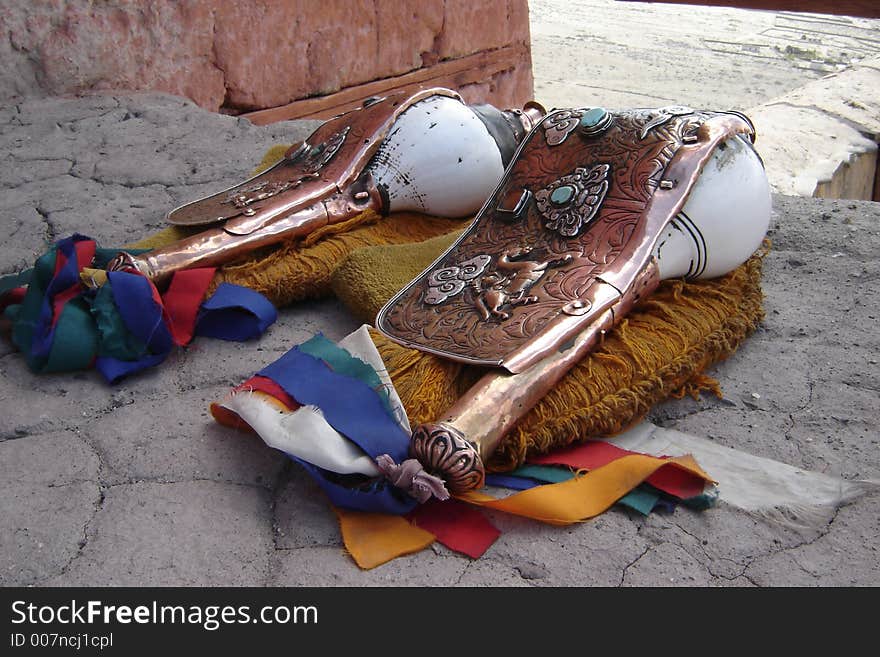 Richly decoracted con shell trumpets sed by Buddhist monks. Photo taken at the Thikse monastery in Ladakh. Richly decoracted con shell trumpets sed by Buddhist monks. Photo taken at the Thikse monastery in Ladakh