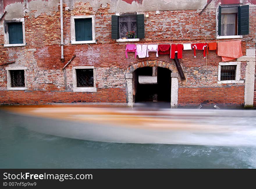 Washing hanging out, in one of the many small canals that makes up the beauty of Venice.
A boat is wizzing by!. Washing hanging out, in one of the many small canals that makes up the beauty of Venice.
A boat is wizzing by!