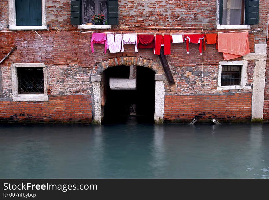 Washing hanging out, in one of the many small canals that makes up the beauty of Venice. Washing hanging out, in one of the many small canals that makes up the beauty of Venice.