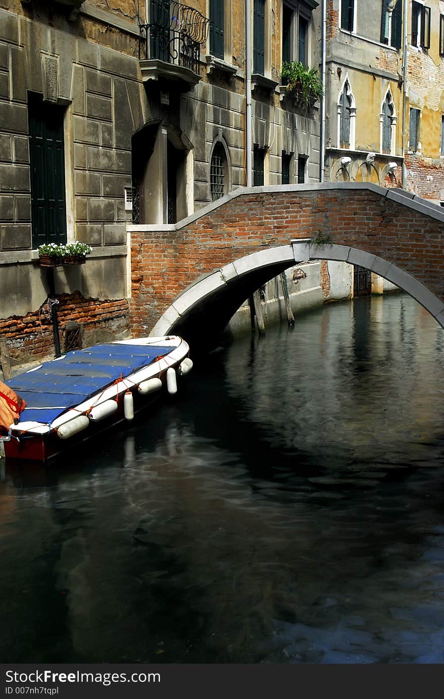 Small bridges lead to many of the big houses that line the canals in Venice. Small bridges lead to many of the big houses that line the canals in Venice.