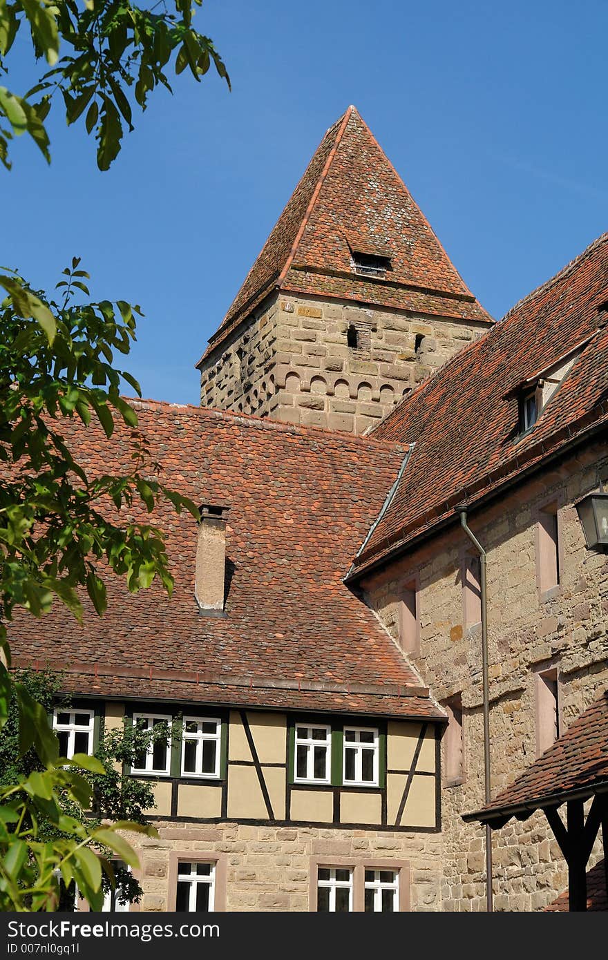 These houses and towers at Maulbronn Abbey compound in Germany are built next to the old town wall. These houses and towers at Maulbronn Abbey compound in Germany are built next to the old town wall.