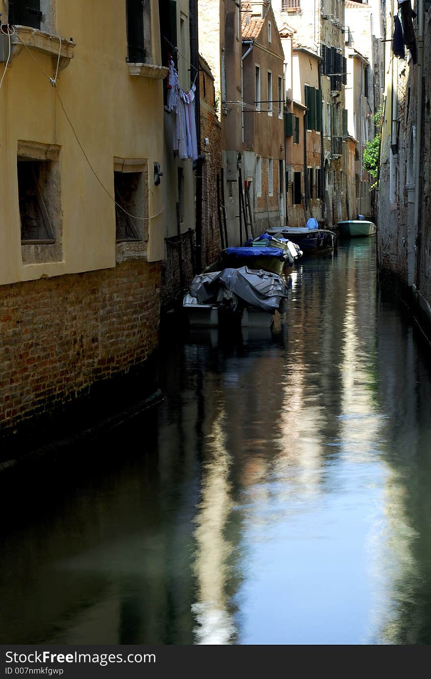 One of the back street canals that makes Venice so tranquil and romantic. One of the back street canals that makes Venice so tranquil and romantic.