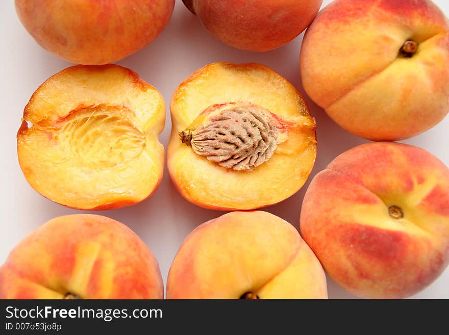 Peaches and piece peach with seed