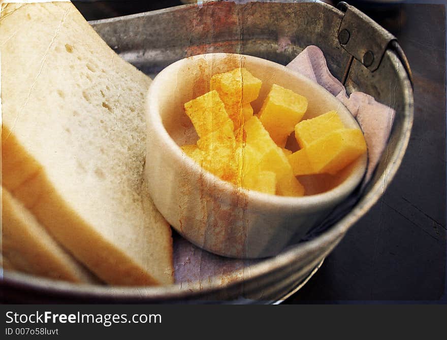 Home-made bread and butter in a zinc bowl. Home-made bread and butter in a zinc bowl