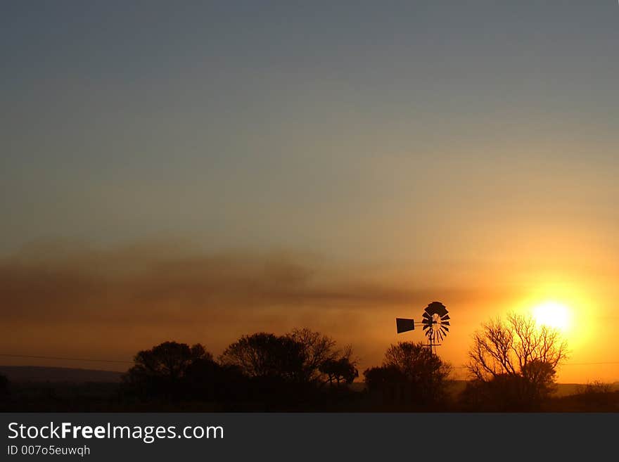 Old windpump sunset