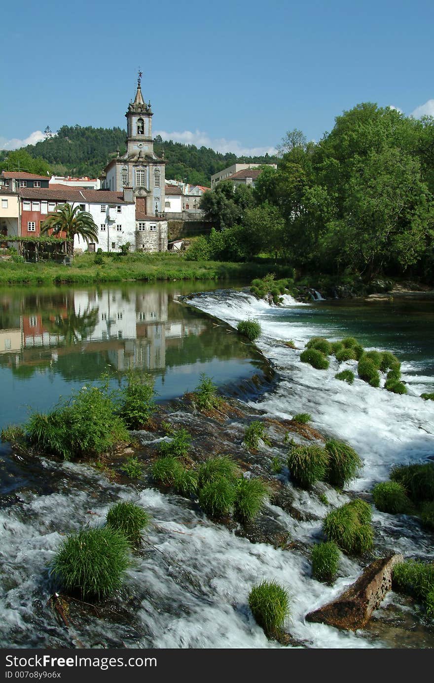 Church on village and waterfall