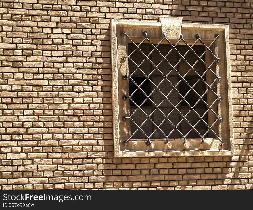 Square iron window of a christian church