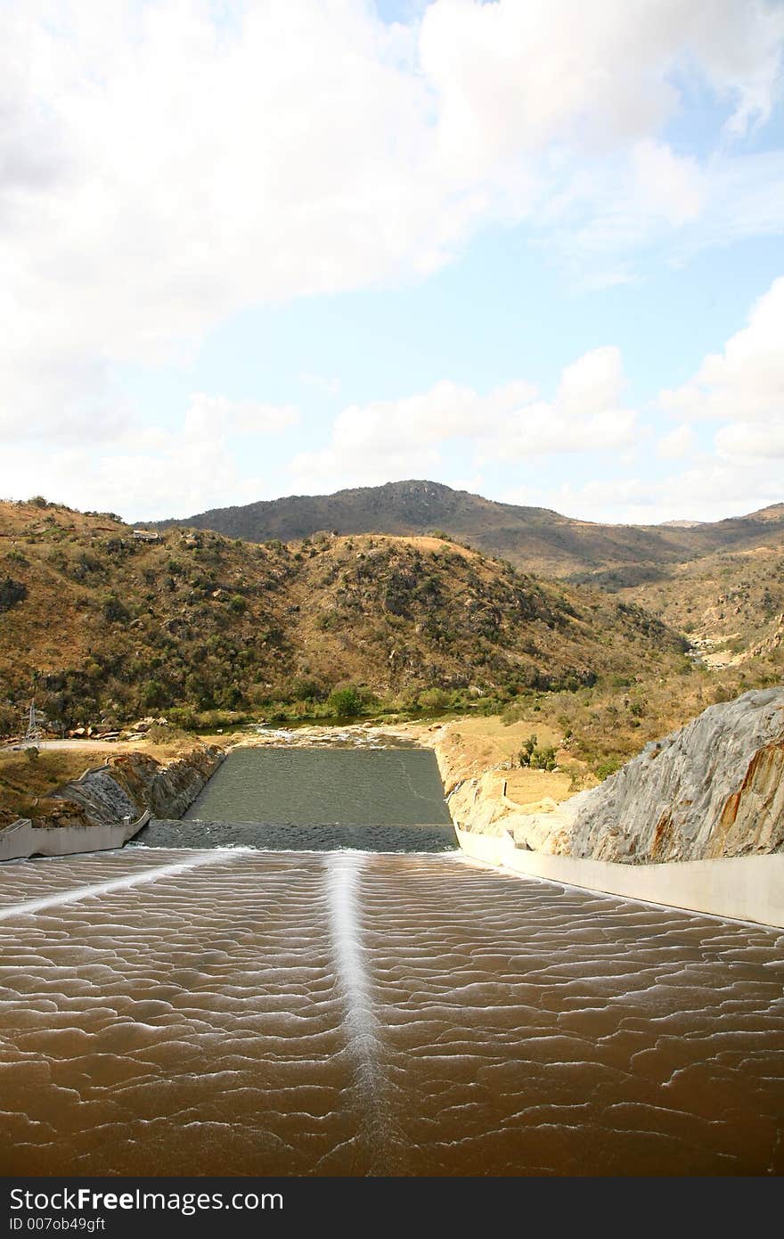 Water running down concrete canal. Water running down concrete canal