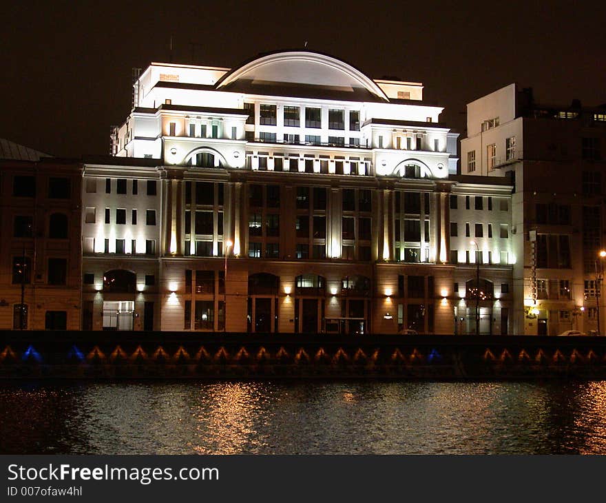 illuminated searchlight building in the night. illuminated searchlight building in the night