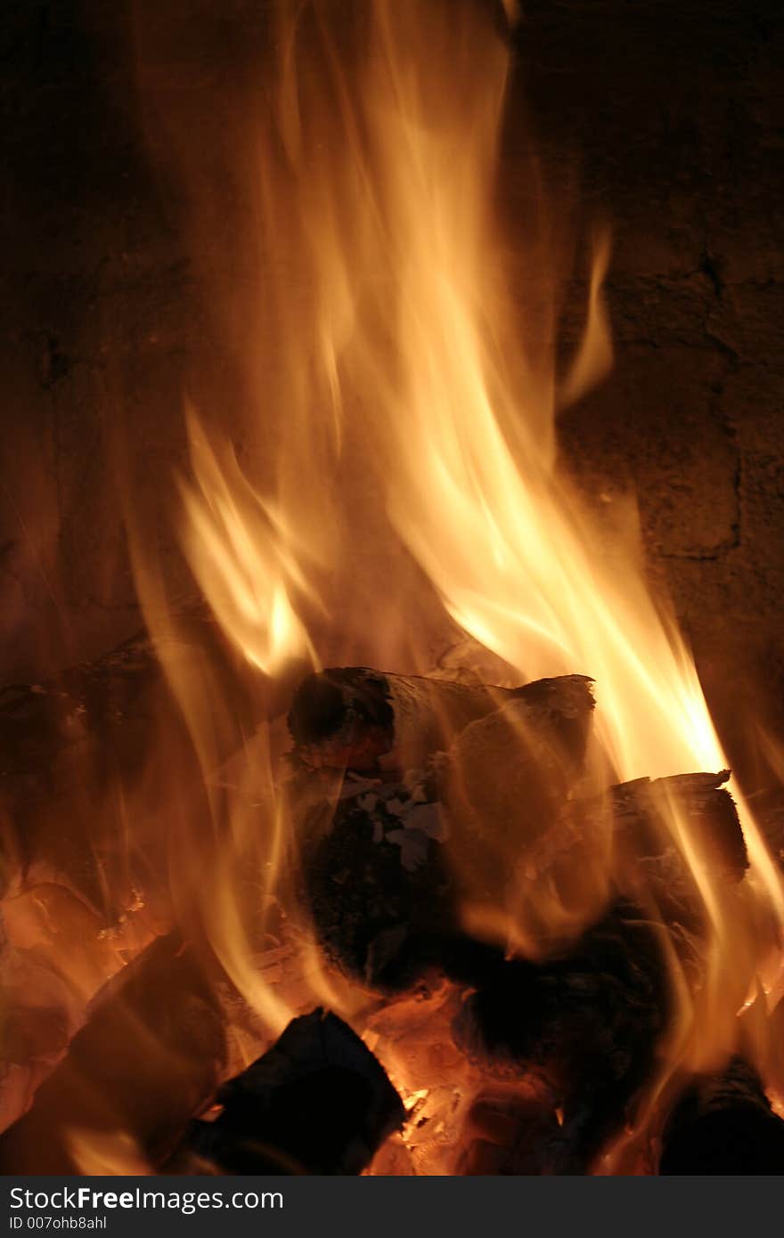 Wood in the process of burning. Wood in the process of burning