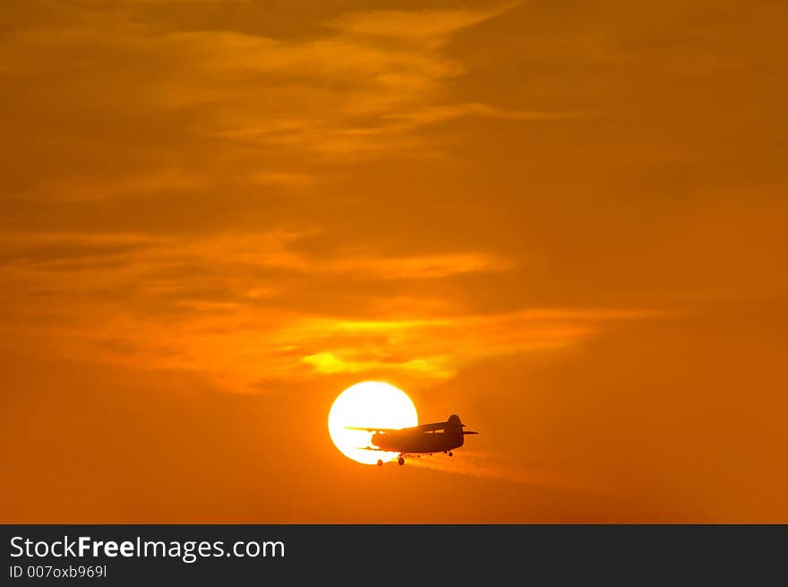 Sunset With Plane