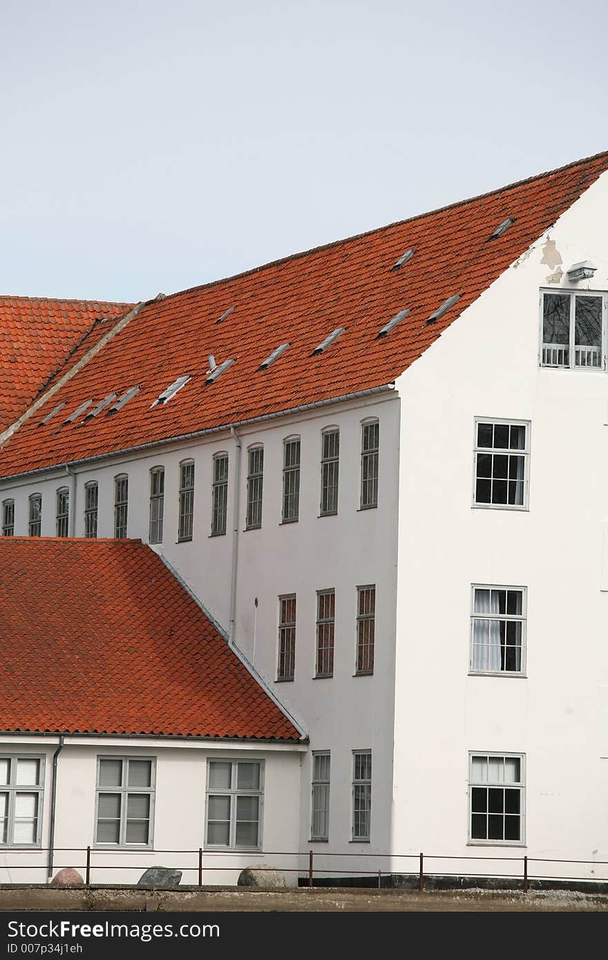 White large  traditional house   in denmark a sunny winter day. White large  traditional house   in denmark a sunny winter day