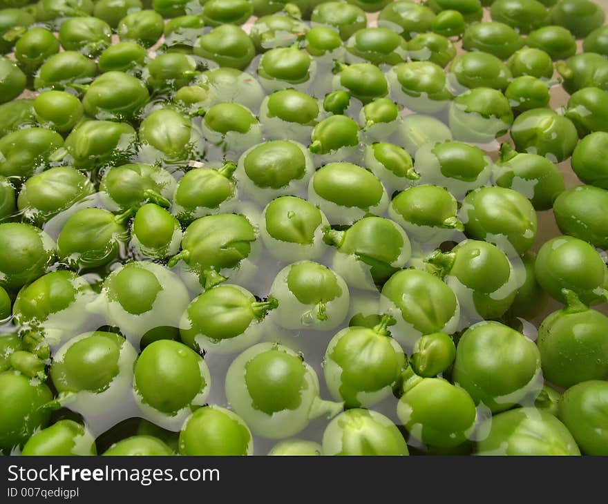 Green floating peas. Green floating peas