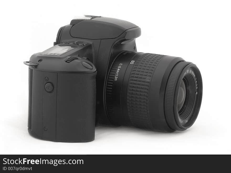 A black slr film camera on a white background. A black slr film camera on a white background