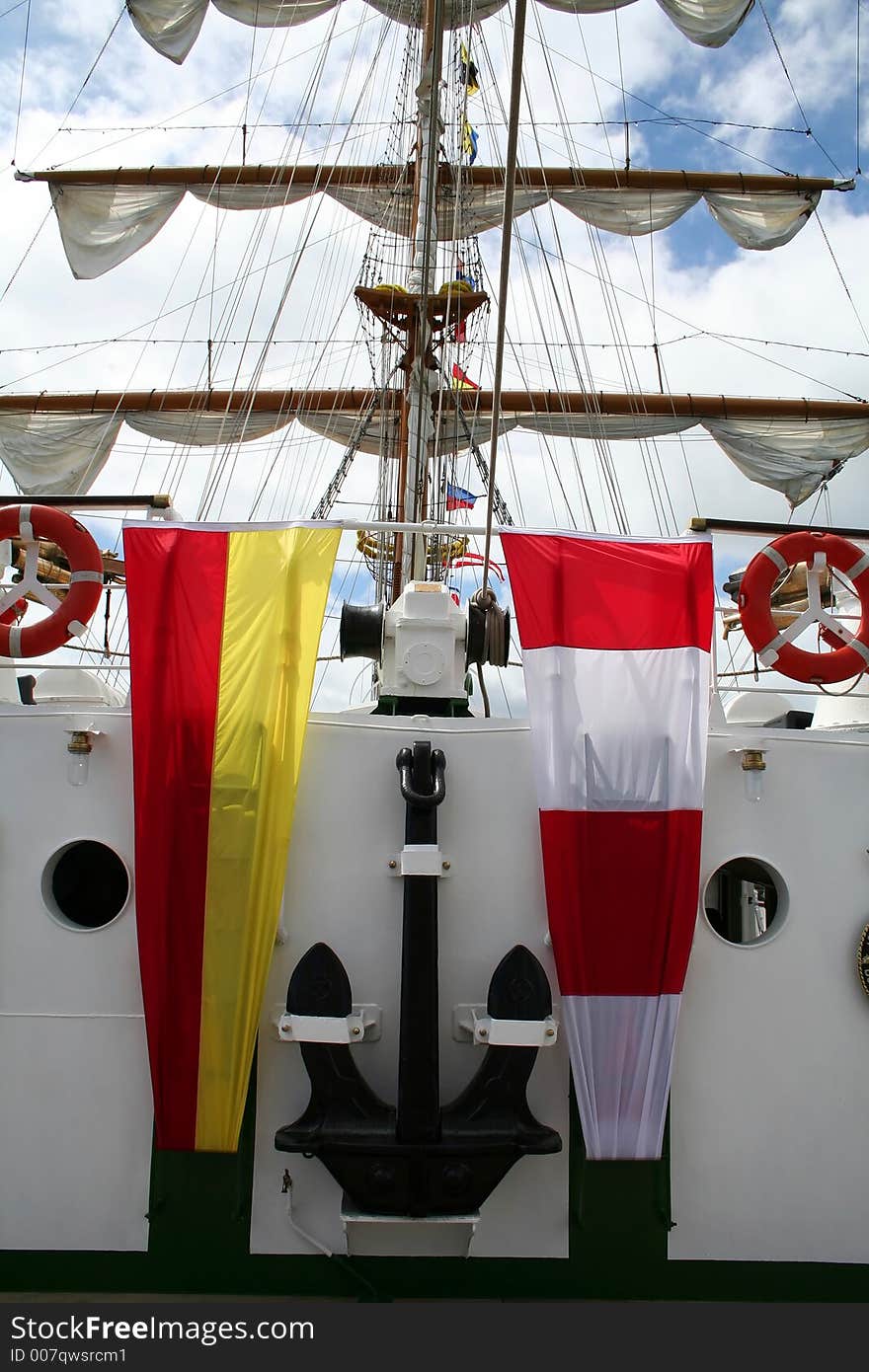 Sailboat anchor and mast on the deck