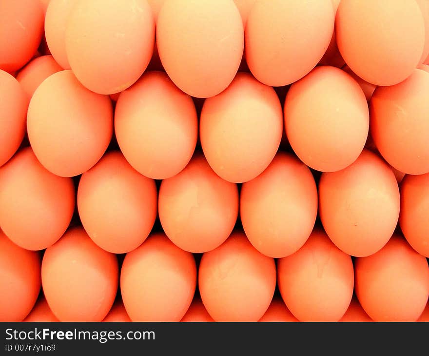 A photo of eggs arranged for display in s store