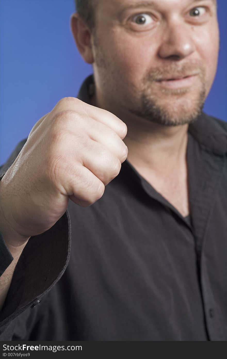 Man showing fist very strong