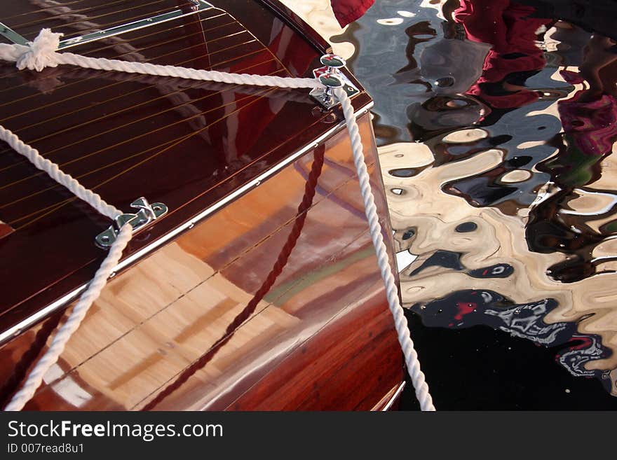 Antique boat reflections in water. Antique boat reflections in water