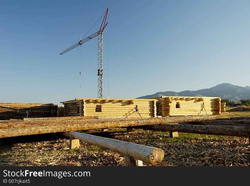 A new log house being constructed in Montana. A new log house being constructed in Montana.