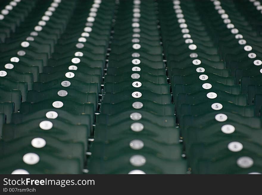 Numbered stadium seats in ballpark