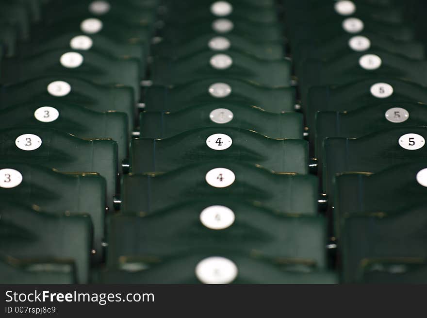 Numbered stadium seats in ballpark