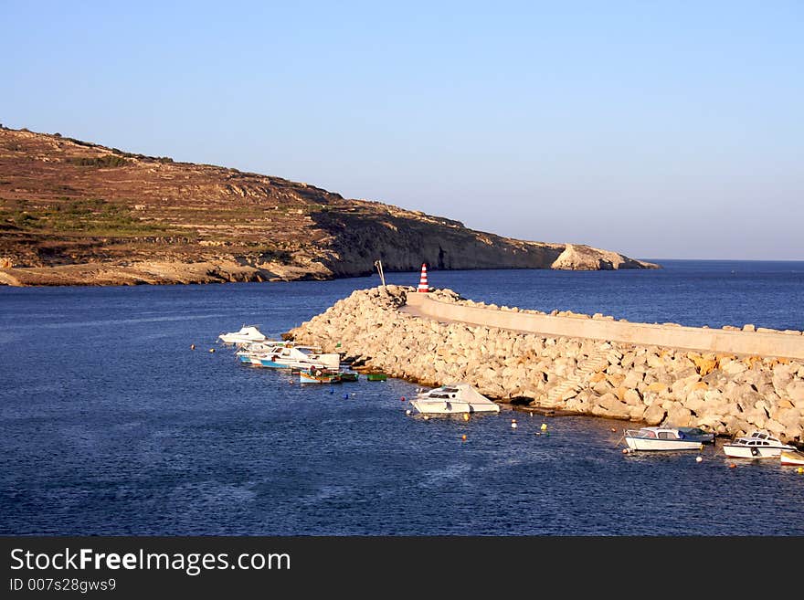 Water-break of Mgarr port on Gozo island, Malta. Water-break of Mgarr port on Gozo island, Malta