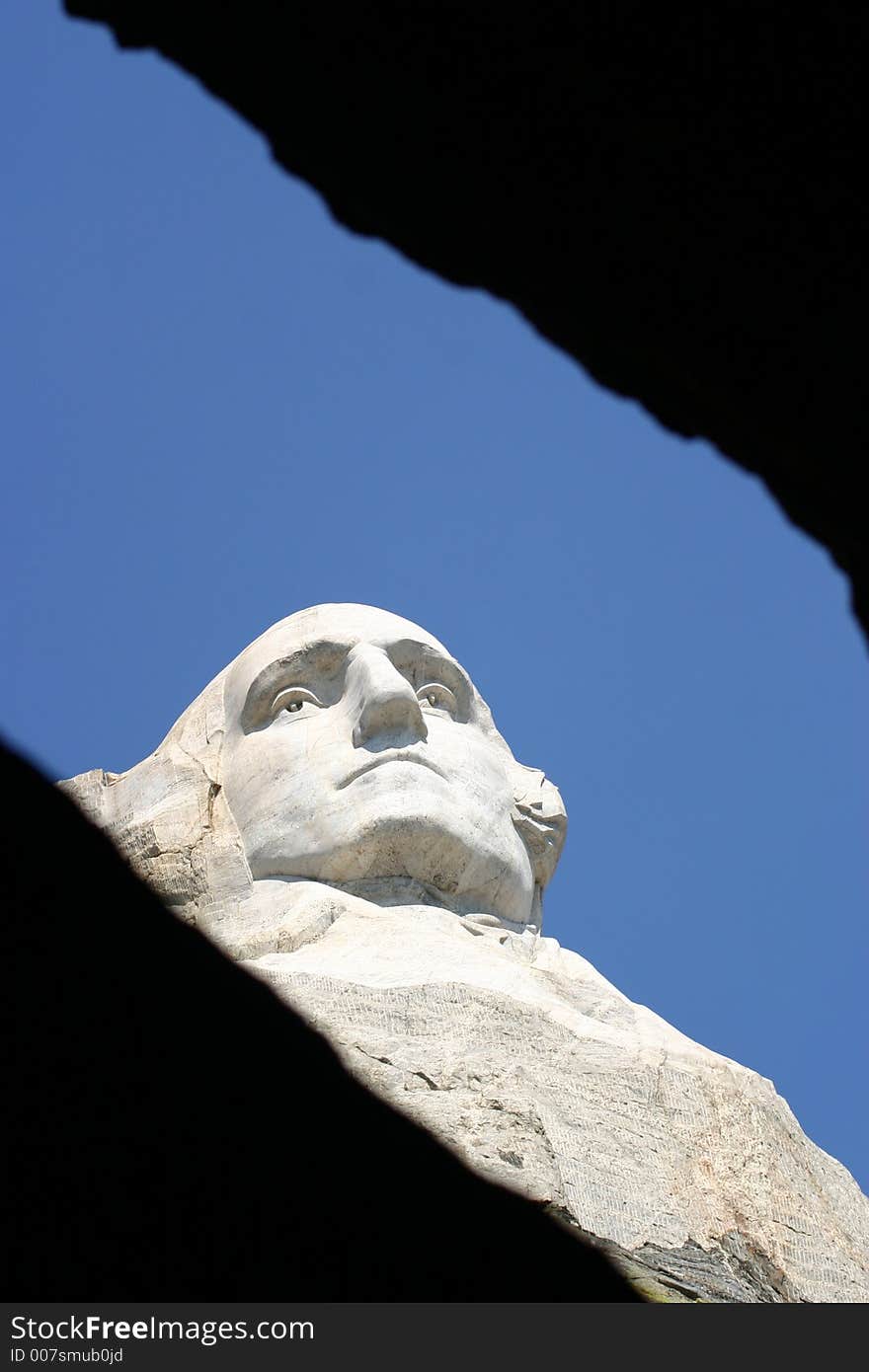 Mt. Rushmore in August with a beautiful blue sky in the background. Mt. Rushmore in August with a beautiful blue sky in the background