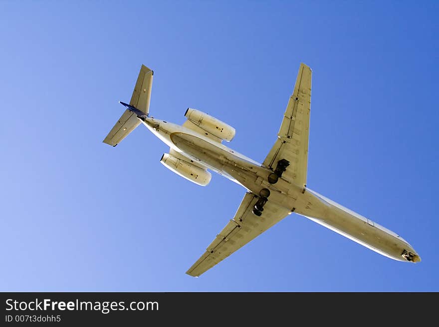 Large jet - possibly a 727, with landing gear down - very close to the ground. Large jet - possibly a 727, with landing gear down - very close to the ground.