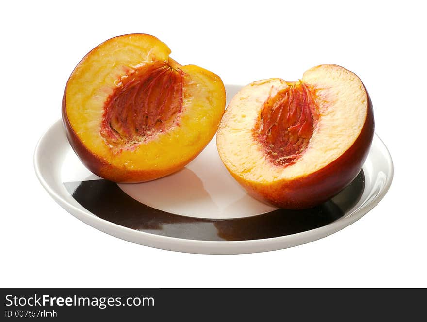 Sliced peach on the plate