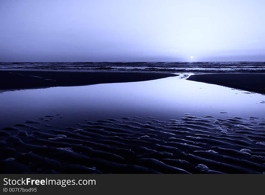 Beautiful blue beach and sunset background