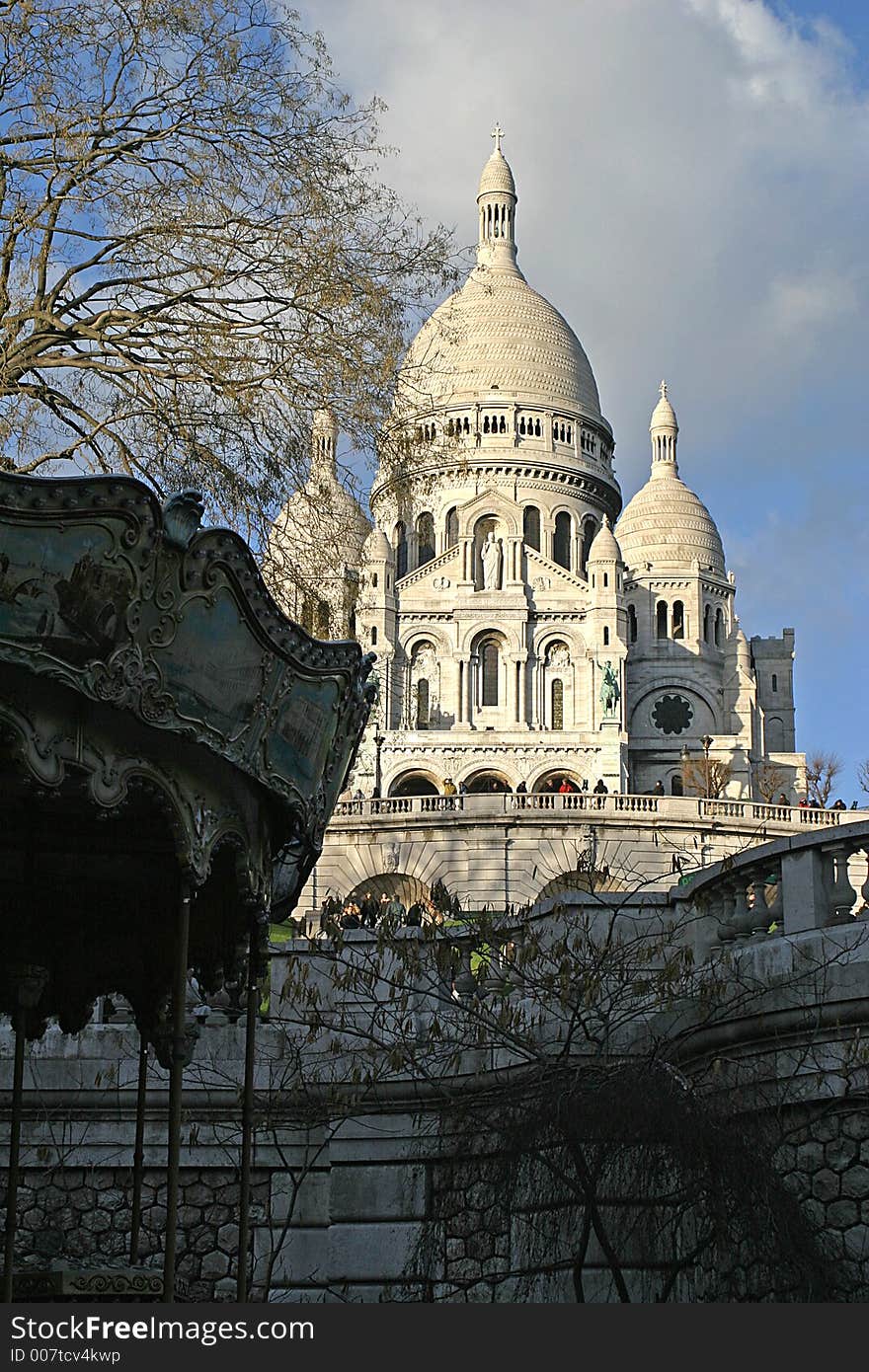 Contrast to a merry-go-round and the Sacré Coeur in Paris. Contrast to a merry-go-round and the Sacré Coeur in Paris.