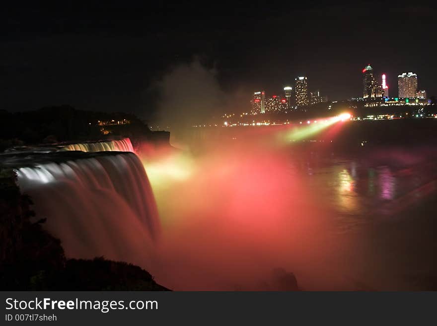 Niagara Falls by Night with Canadian part of the city in a background