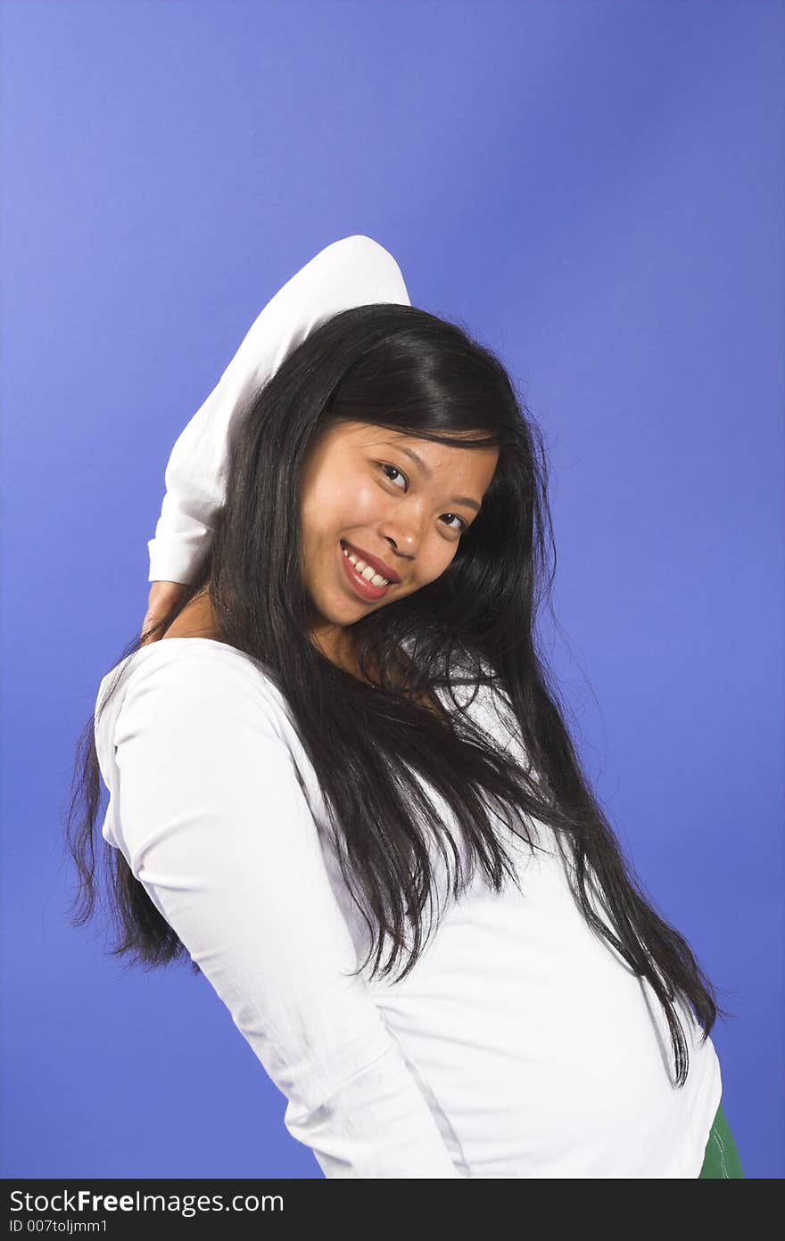 Girl posing over blue background