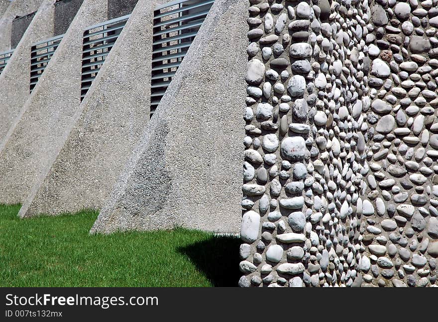 Part of stone wall with windows