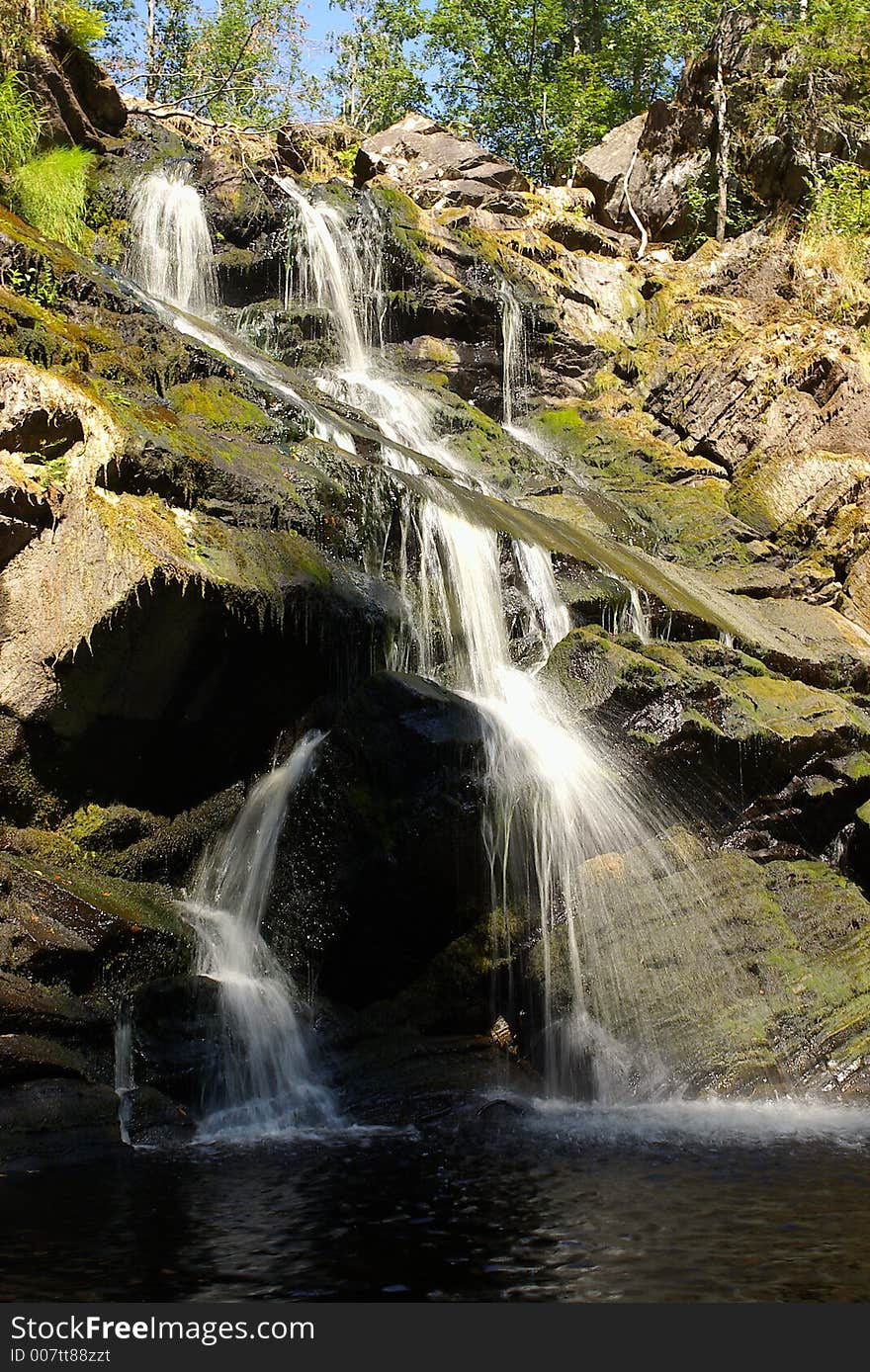 Waterfall on small river in karelian taiga (Russian Nord)