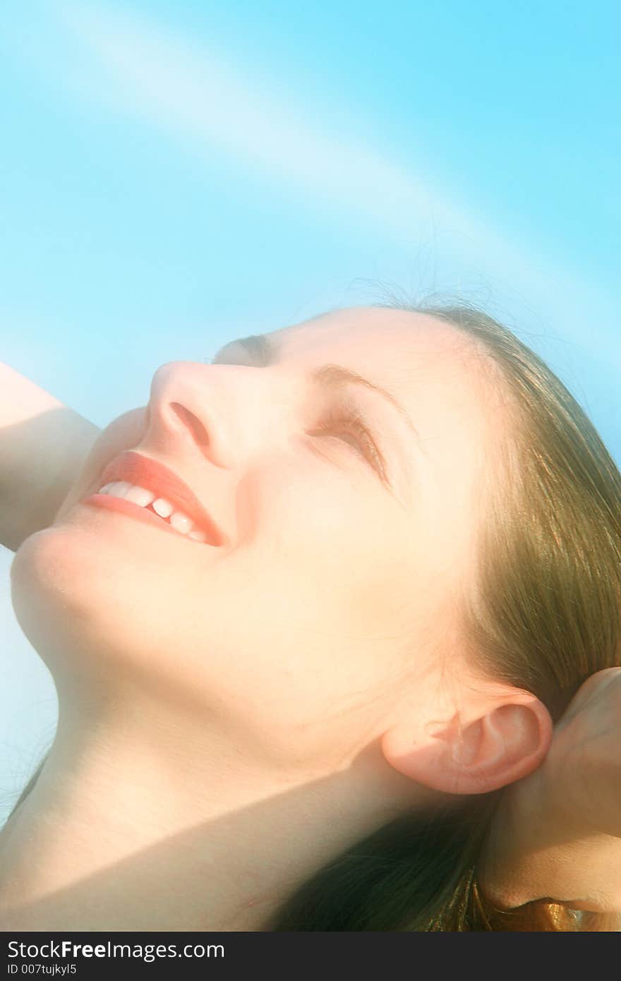 Beautiful caucasian woman smiles confident in the clear sunlight. Beautiful caucasian woman smiles confident in the clear sunlight