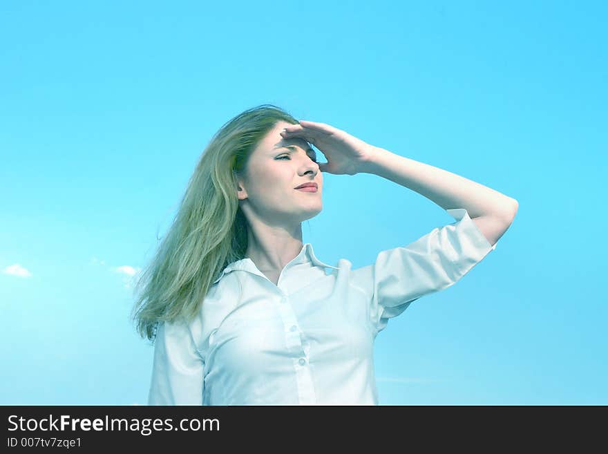 Beautiful caucasian woman smiles confident in the clear sunlight. Beautiful caucasian woman smiles confident in the clear sunlight