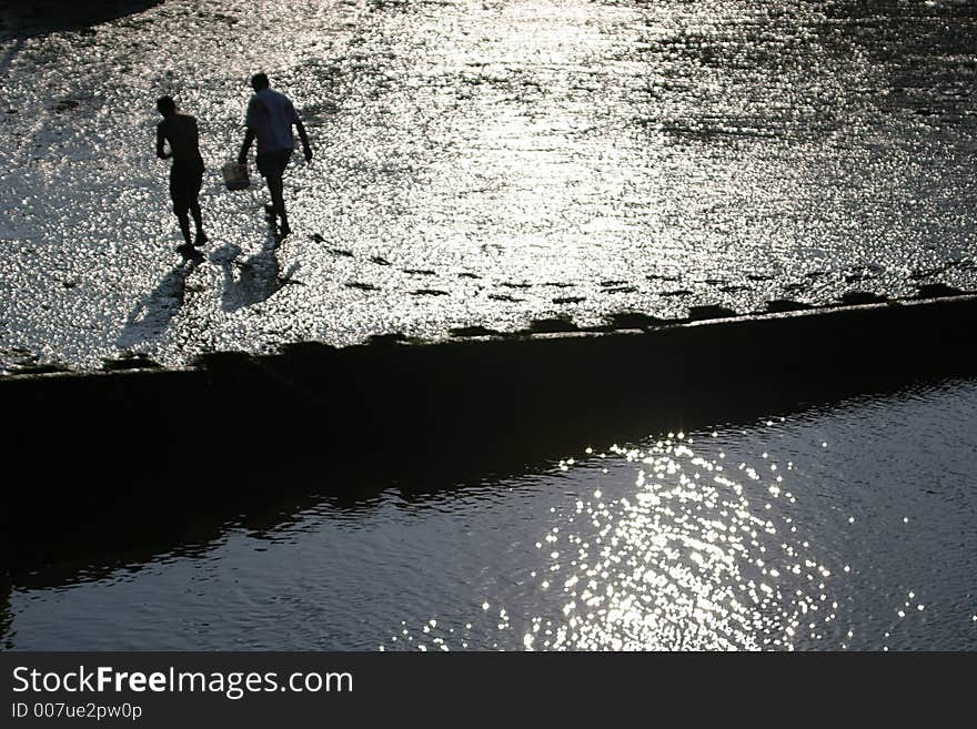 It is ebb in the harbour of Port-en-Bessin. Fishermen have left their footsteps. It is ebb in the harbour of Port-en-Bessin. Fishermen have left their footsteps.